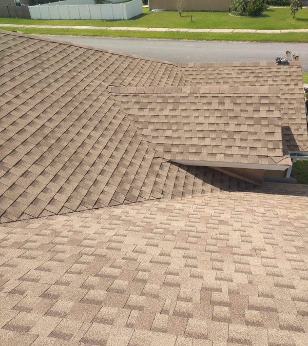 The Pros and Cons of Asphalt Shingles vs. Metal Roofing